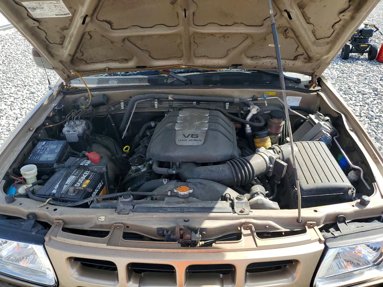 2001 Isuzu Rodeo S Tan vin: 4S2CK58W714306169
