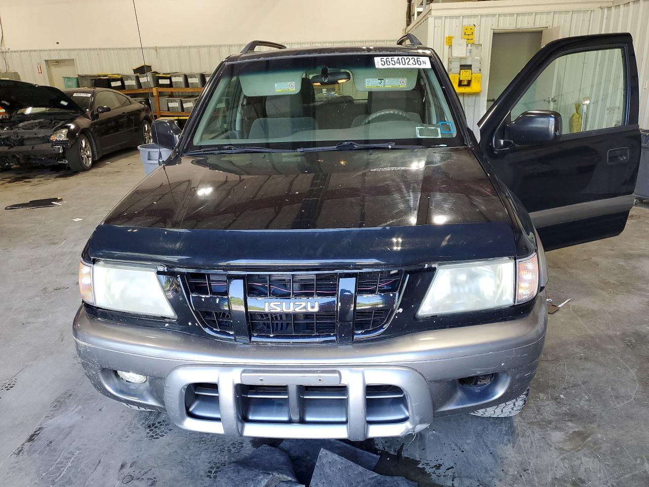 2003 Isuzu Rodeo S Black vin: 4S2CK58WX34311949