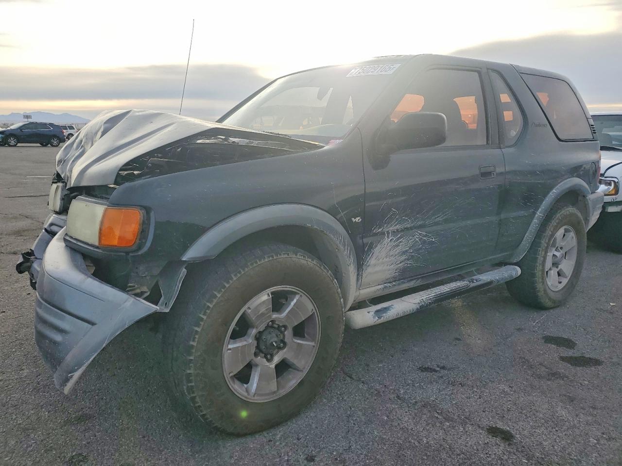 1999 Isuzu Amigo Black vin: 4S2CM57W5X4330538
