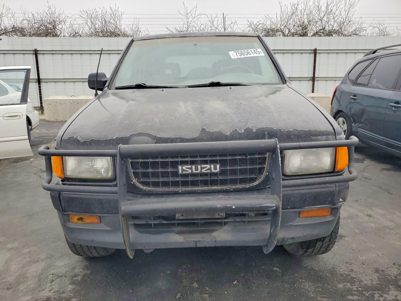1997 Isuzu Rodeo Black vin: 4S2CM58V0V4302679
