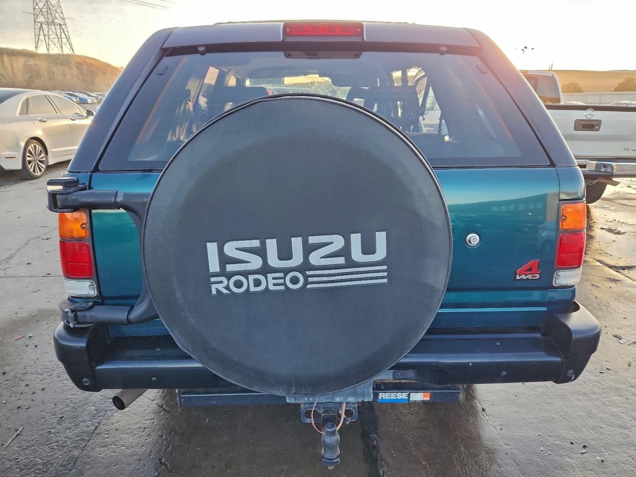 1997 Isuzu Rodeo S Green vin: 4S2CM58V1V4337554