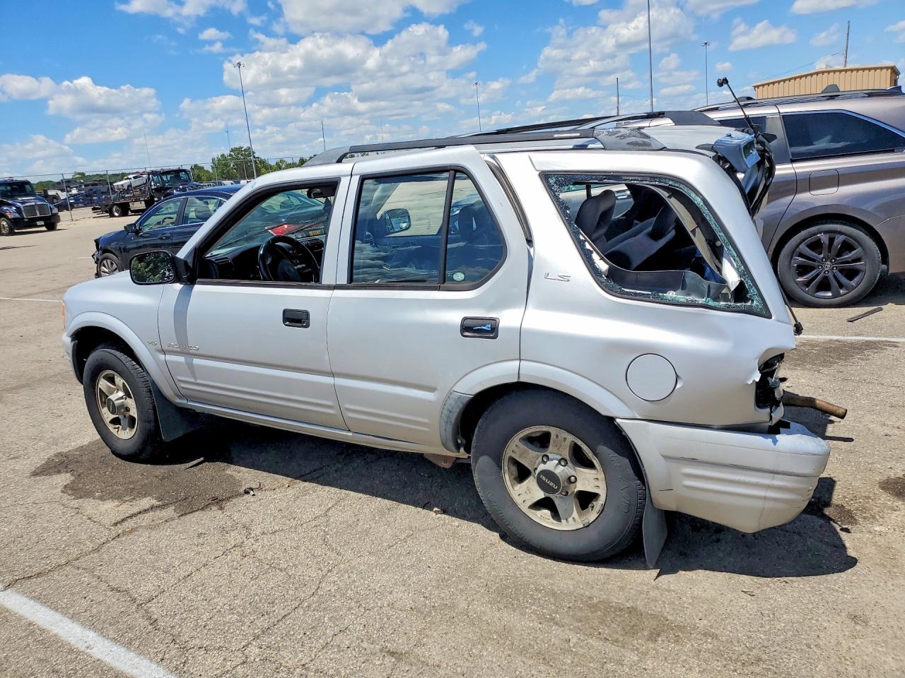 1999 Isuzu Rodeo S Серебряный vin: 4S2CM58W3X4378876