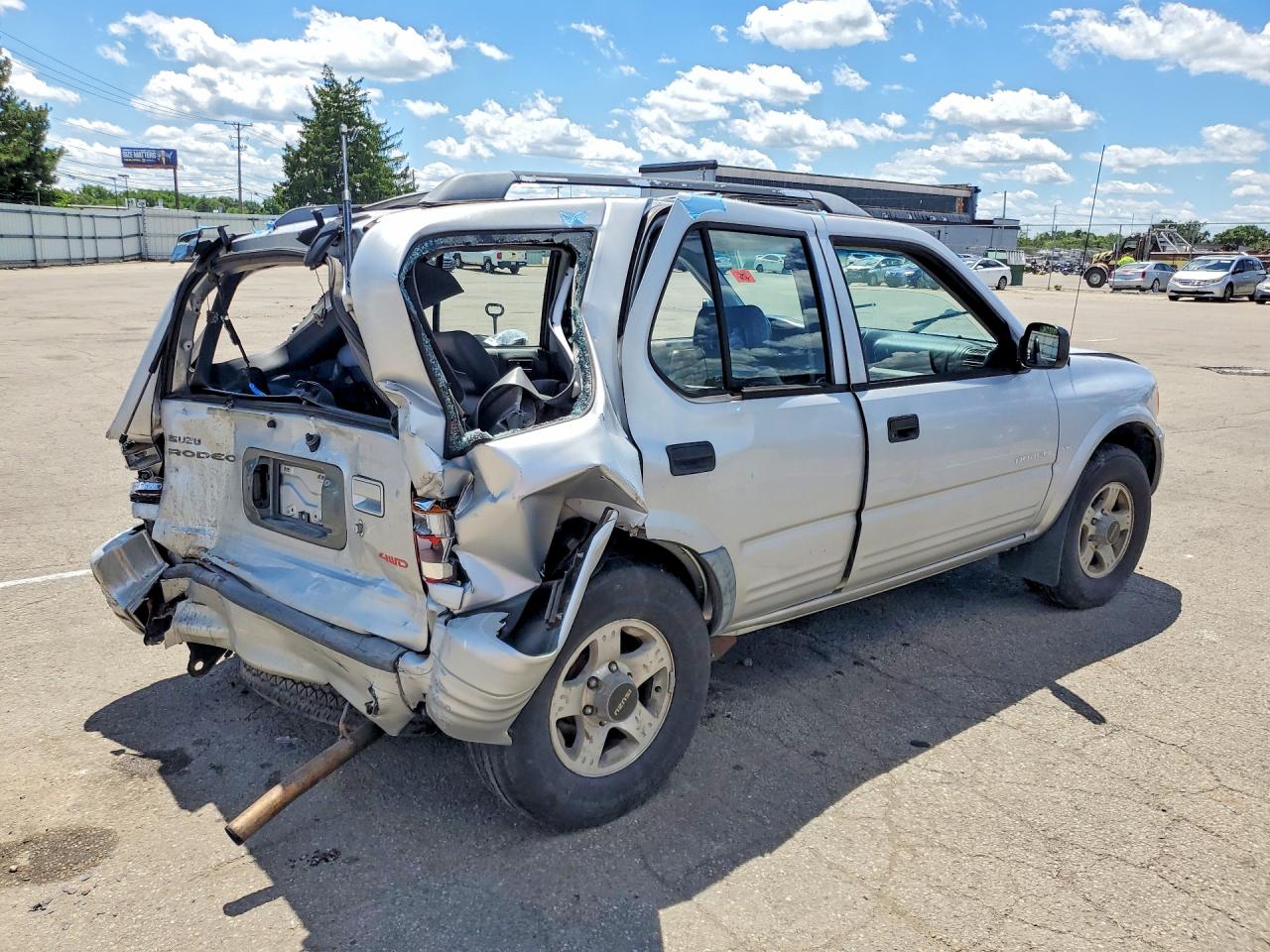 1999 Isuzu Rodeo S Серебряный vin: 4S2CM58W3X4378876