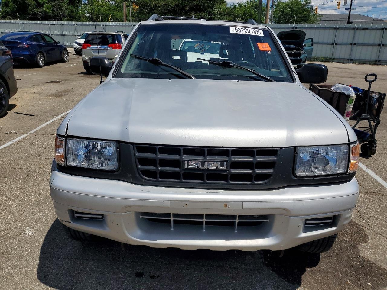 1999 Isuzu Rodeo S Серебряный vin: 4S2CM58W3X4378876