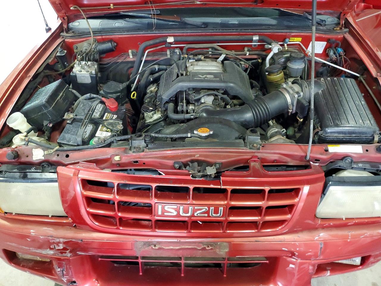 1999 Isuzu Rodeo Red vin: 4S2CM58WXX4362514