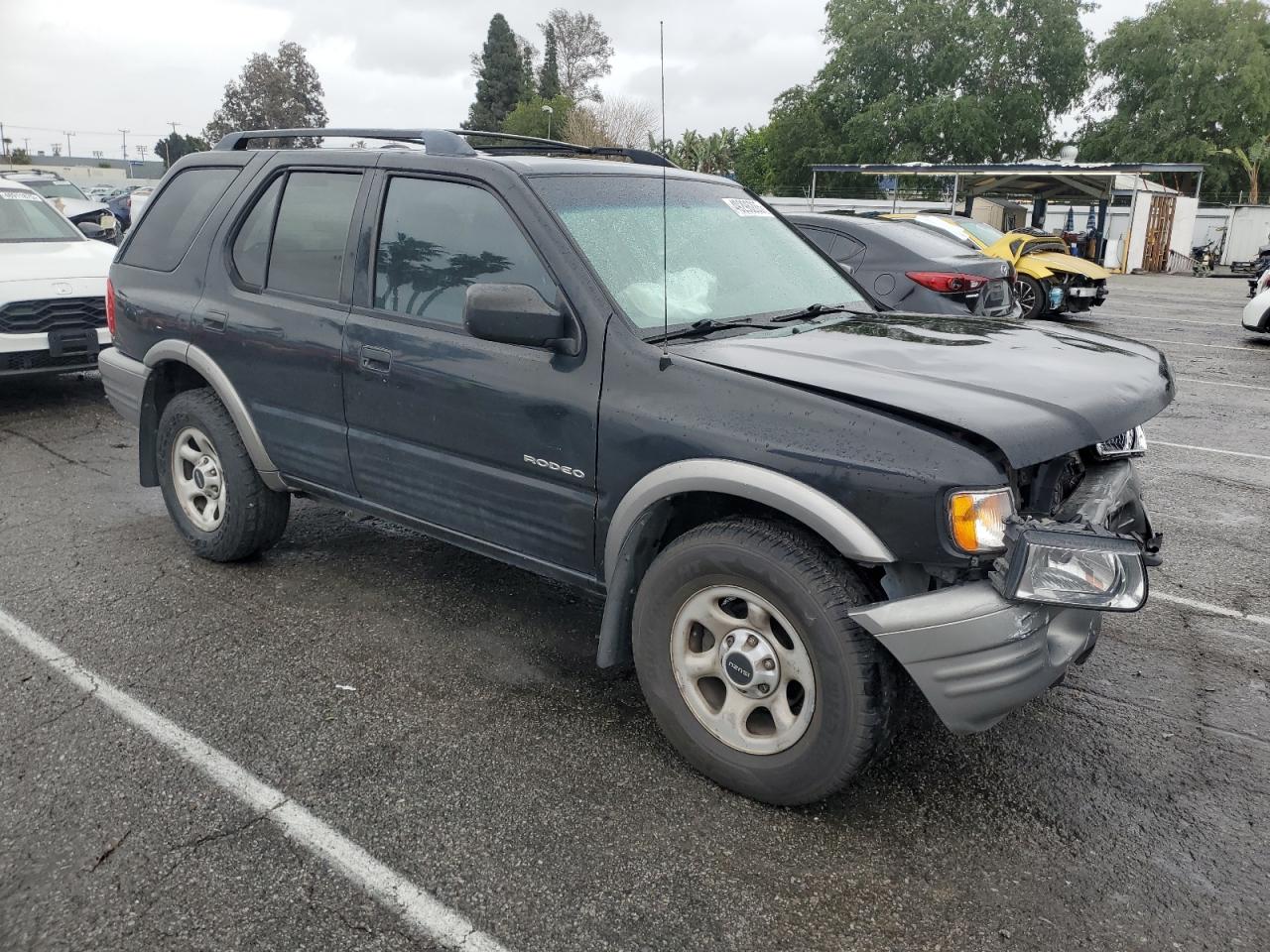 2002 Isuzu Rodeo Black vin: 4S2DM58W424304881