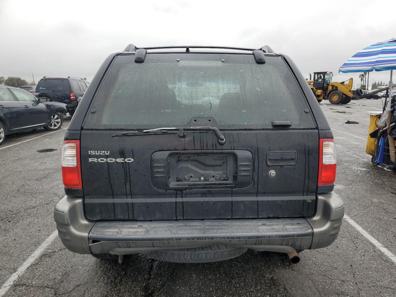 2002 Isuzu Rodeo Black vin: 4S2DM58W424304881