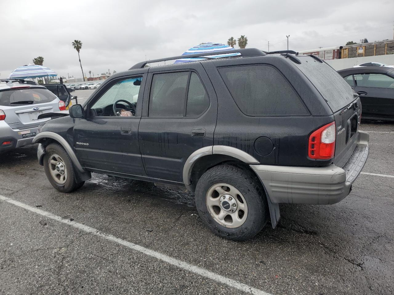 2002 Isuzu Rodeo Black vin: 4S2DM58W424304881