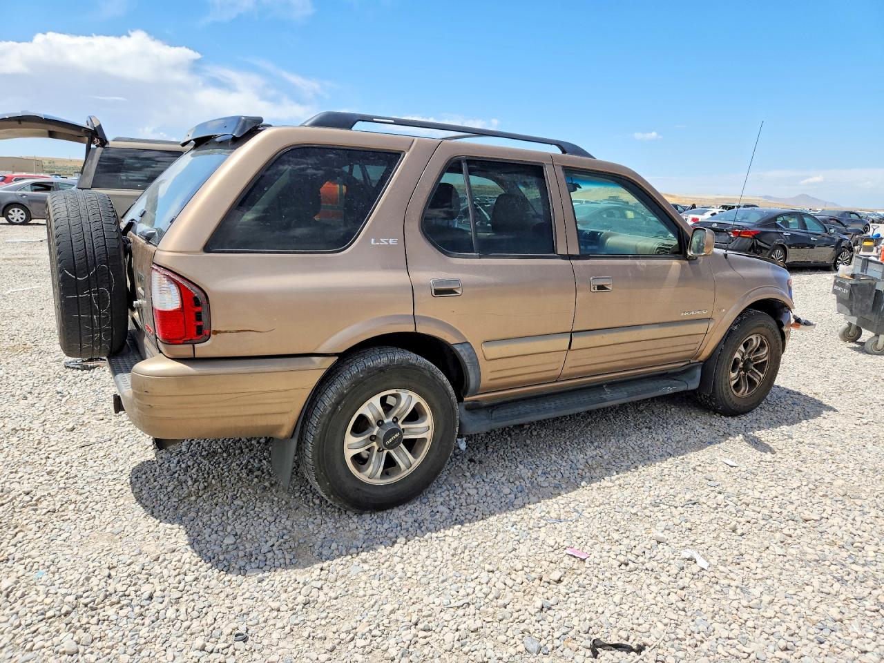 2000 Isuzu Rodeo S Tan vin: 4S2DM58W8Y4326455