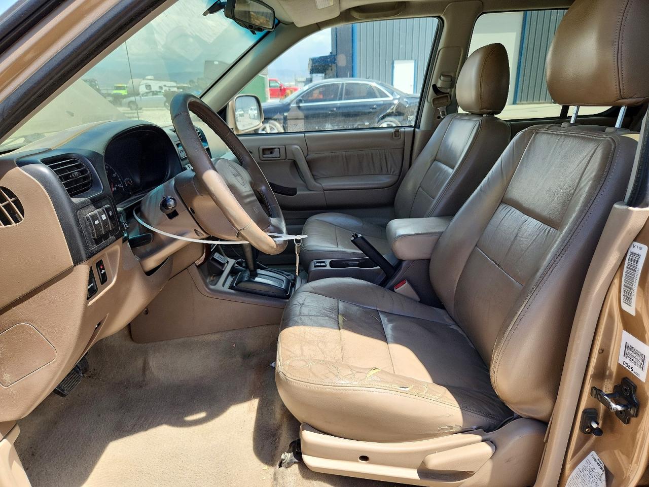 2000 Isuzu Rodeo S Tan vin: 4S2DM58W8Y4326455