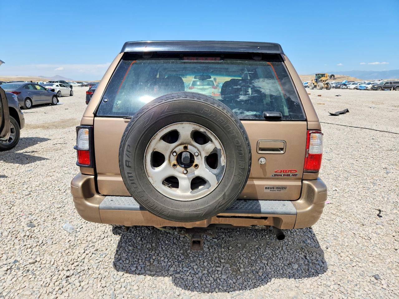 2000 Isuzu Rodeo S Tan vin: 4S2DM58W8Y4326455