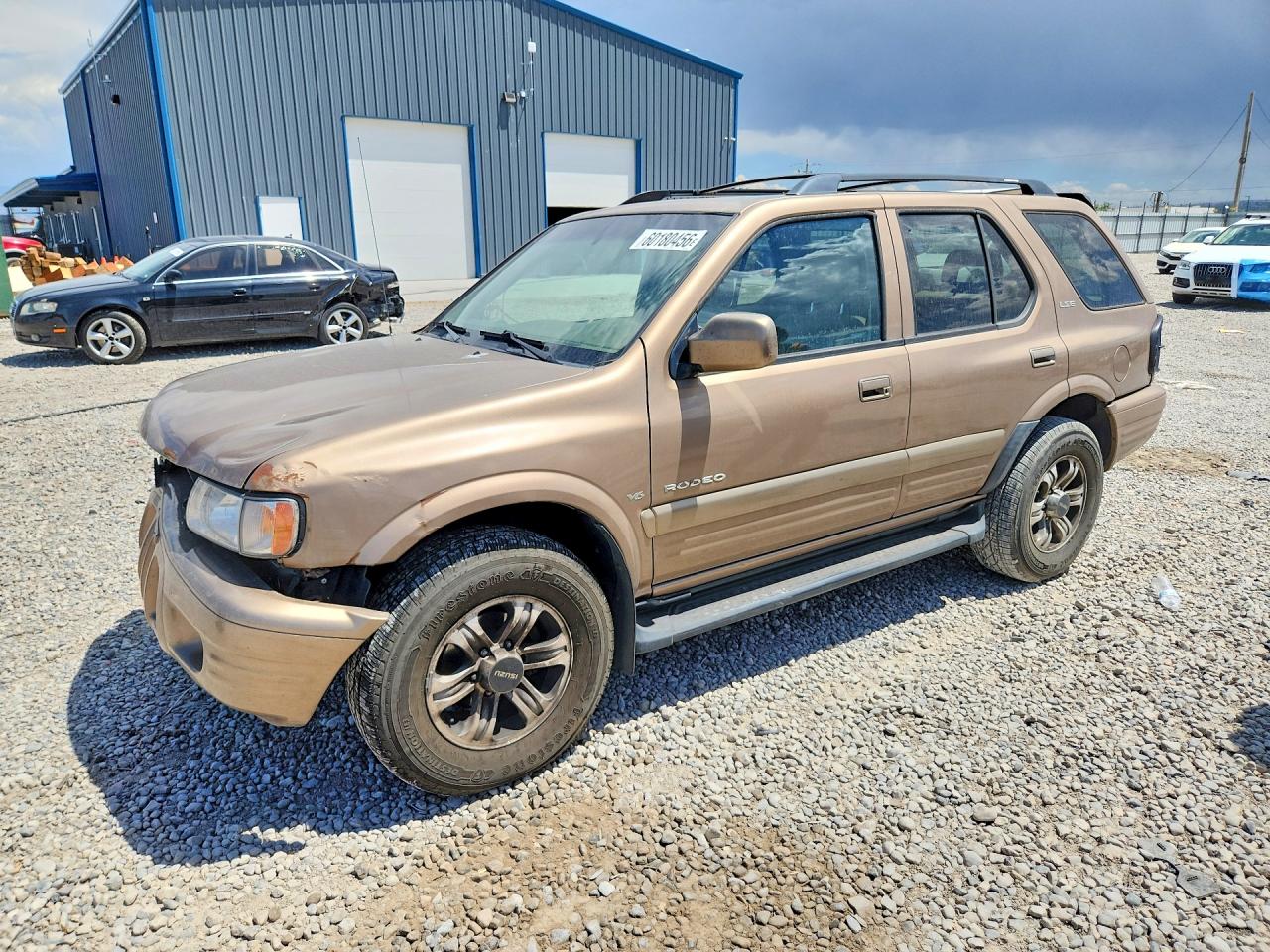 2000 Isuzu Rodeo S Tan vin: 4S2DM58W8Y4326455