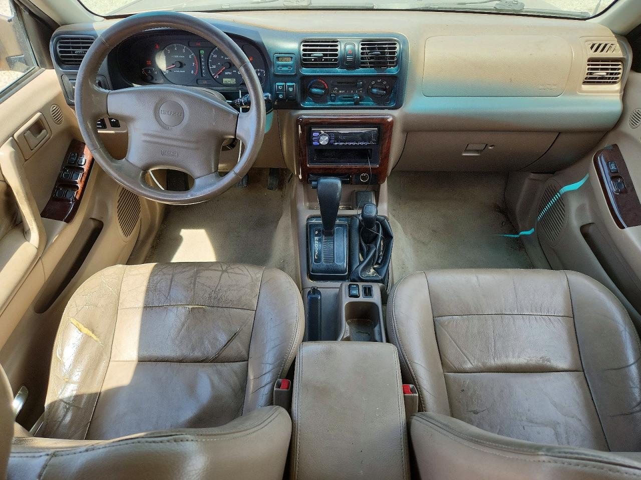 2000 Isuzu Rodeo S Tan vin: 4S2DM58W8Y4326455