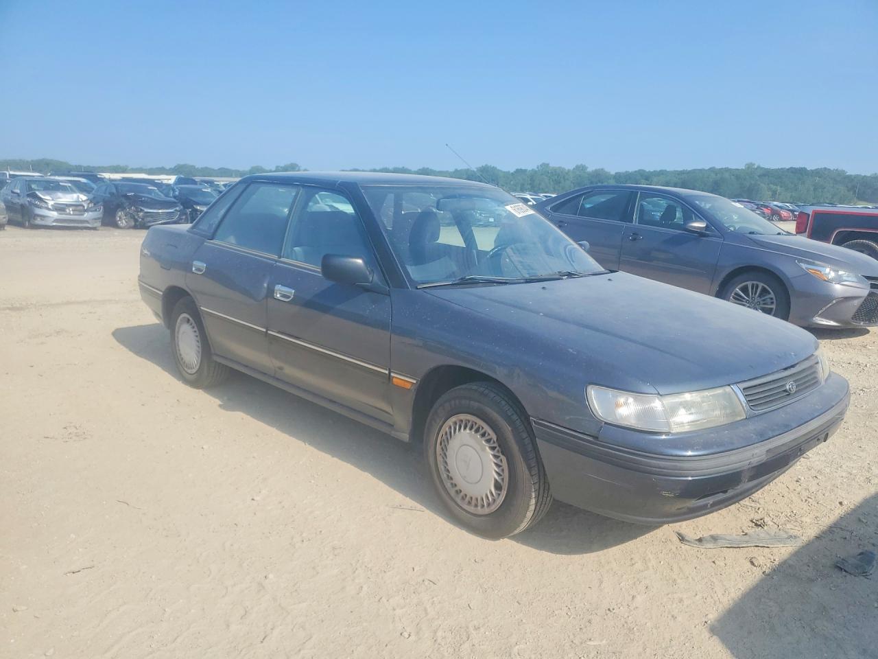 1993 Subaru Legacy L Blue vin: 4S3BC6331P9648428