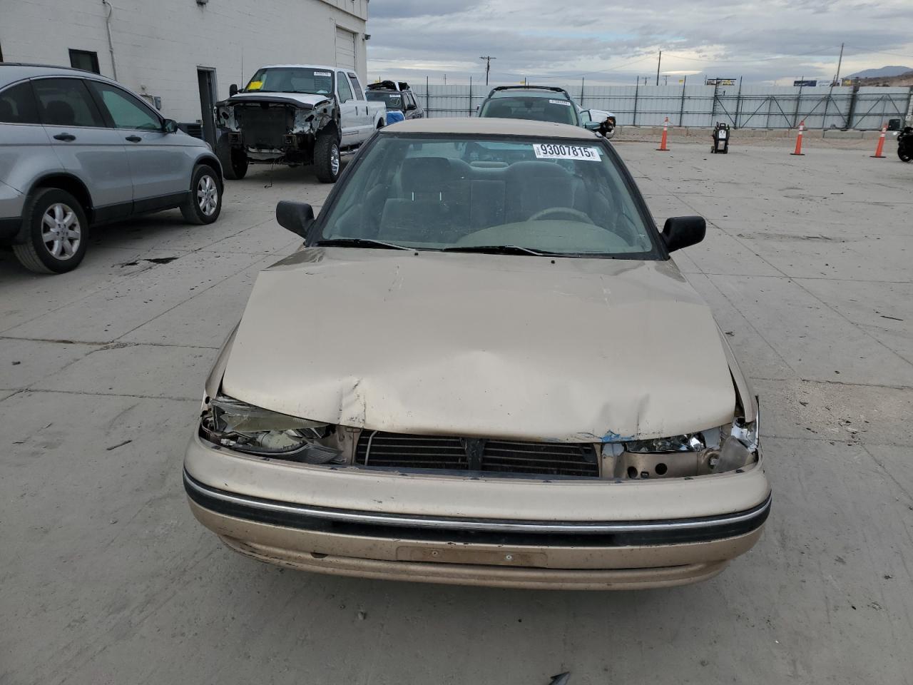 1993 Subaru Legacy L Tan vin: 4S3BC6334P7654879