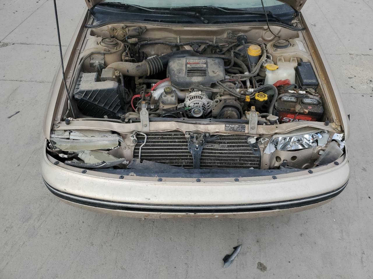 1993 Subaru Legacy L Tan vin: 4S3BC6334P7654879