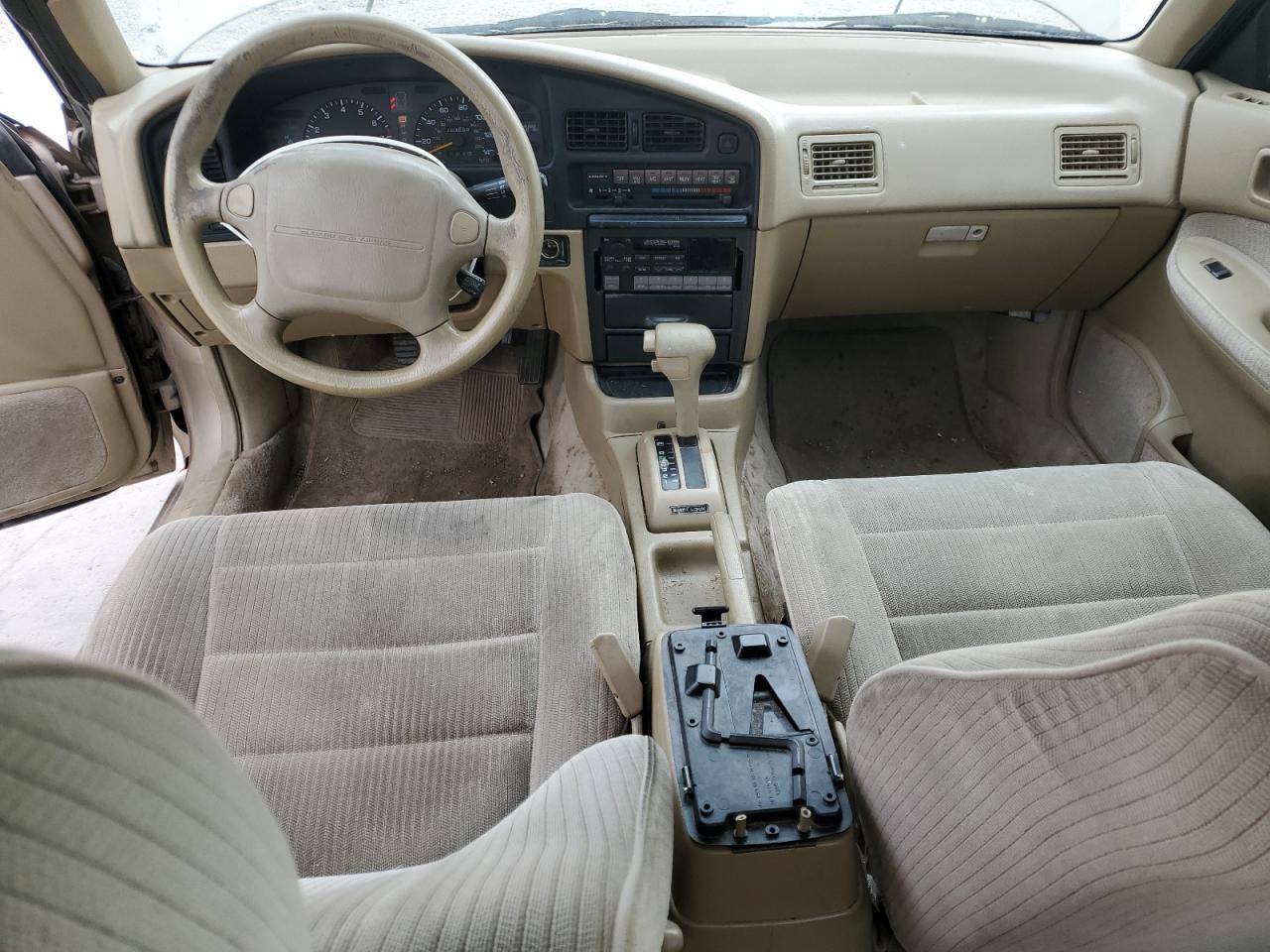 1993 Subaru Legacy L Tan vin: 4S3BC6334P7654879