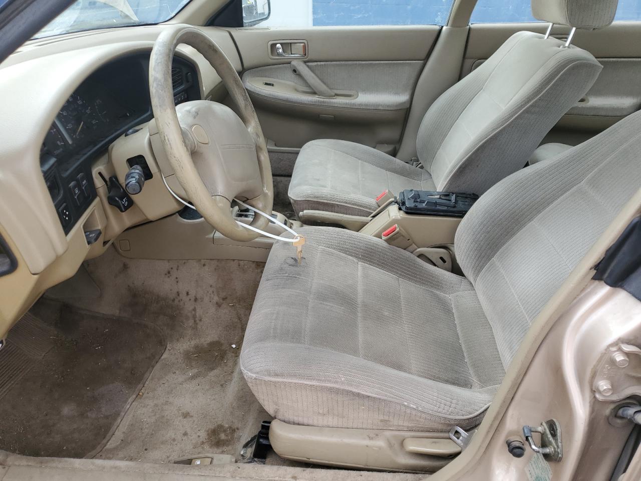1993 Subaru Legacy L Tan vin: 4S3BC6334P7654879