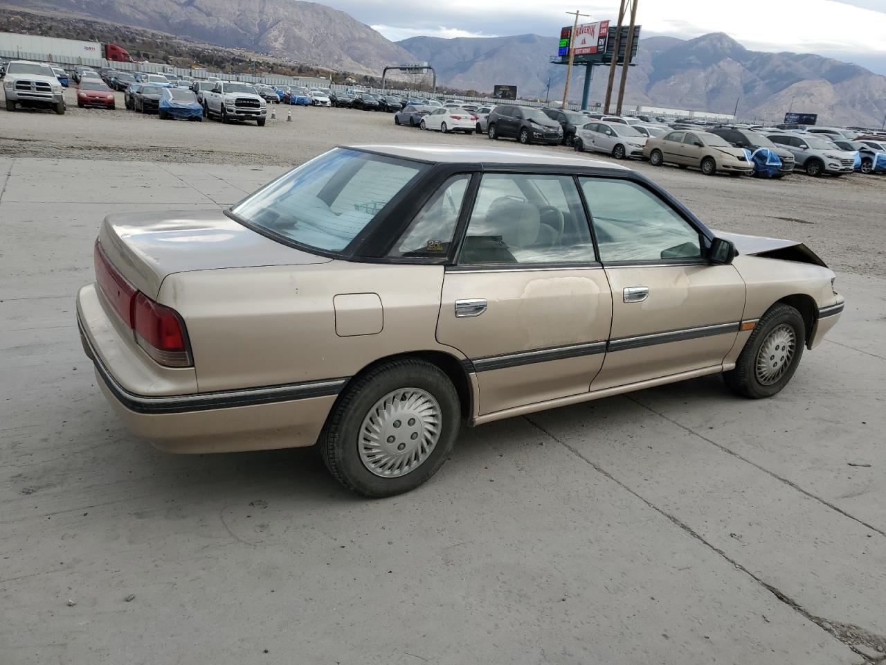 1993 Subaru Legacy L Tan vin: 4S3BC6334P7654879