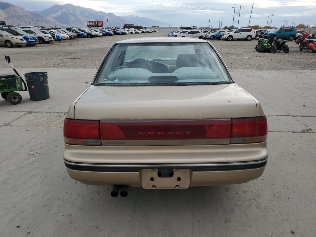 1993 Subaru Legacy L Tan vin: 4S3BC6334P7654879