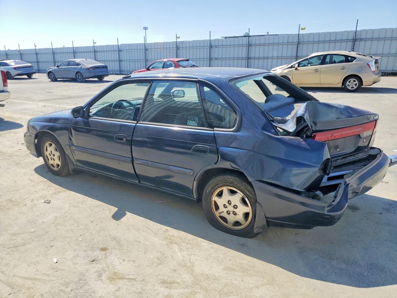 1998 Subaru Legacy L Blue vin: 4S3BD4352W7211549