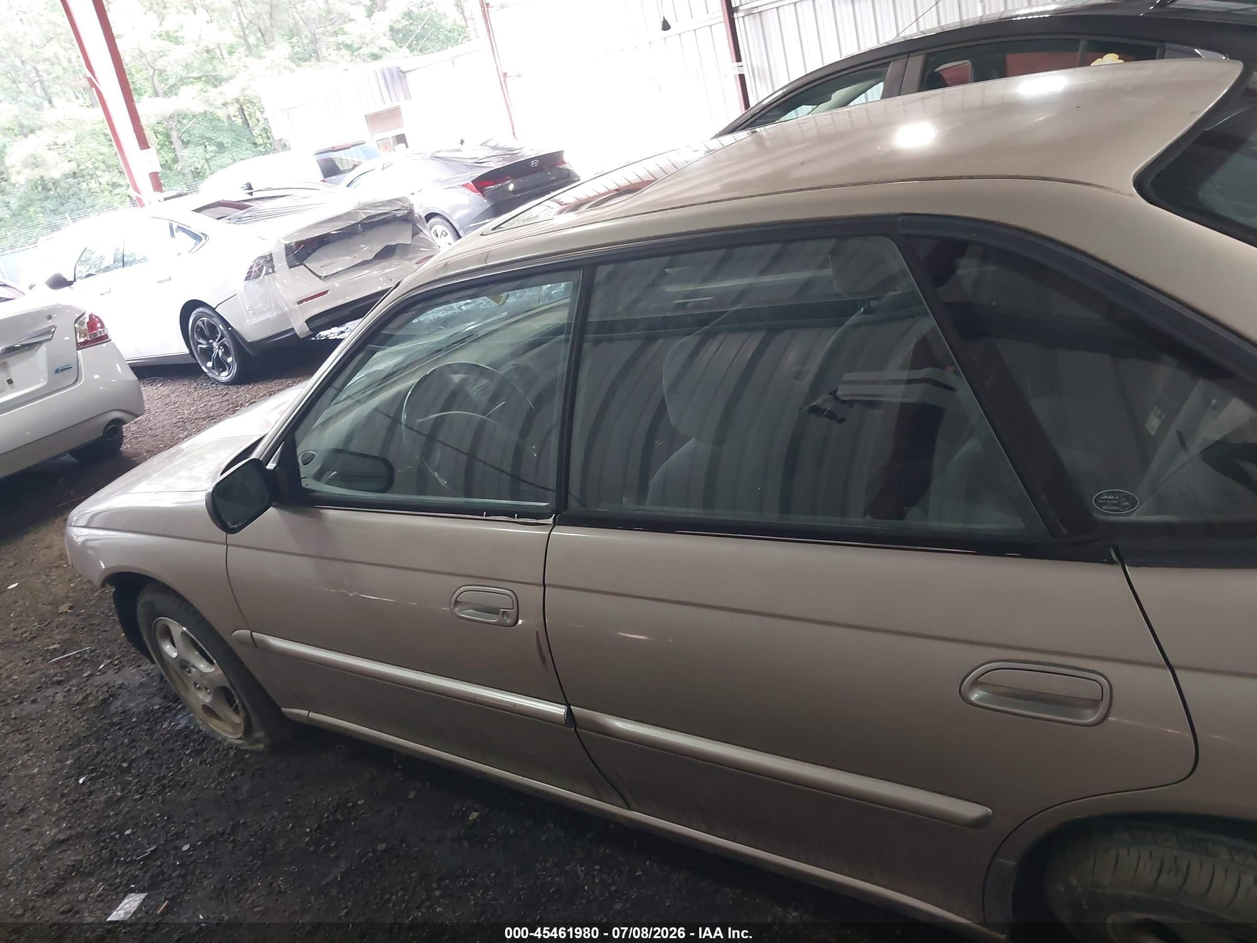 1999 Subaru Legacy 30th Ann. L/l Champagne vin: 4S3BD4355X6263491