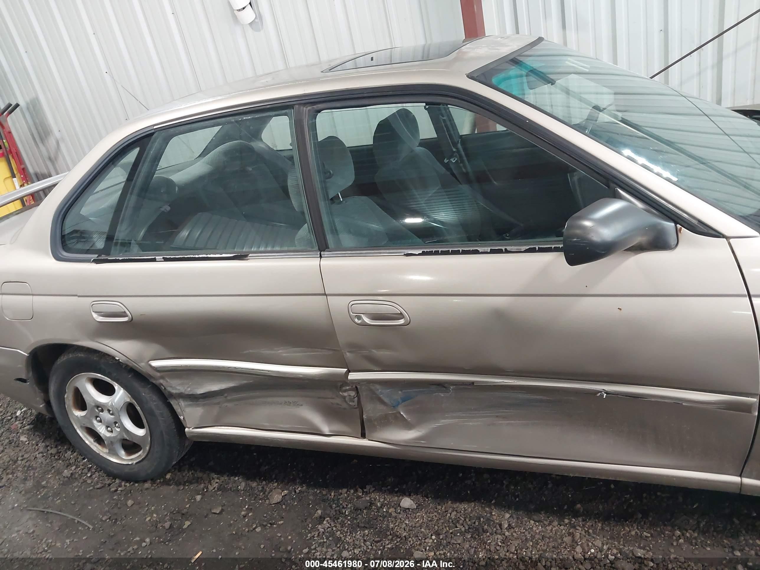 1999 Subaru Legacy 30th Ann. L/l Champagne vin: 4S3BD4355X6263491