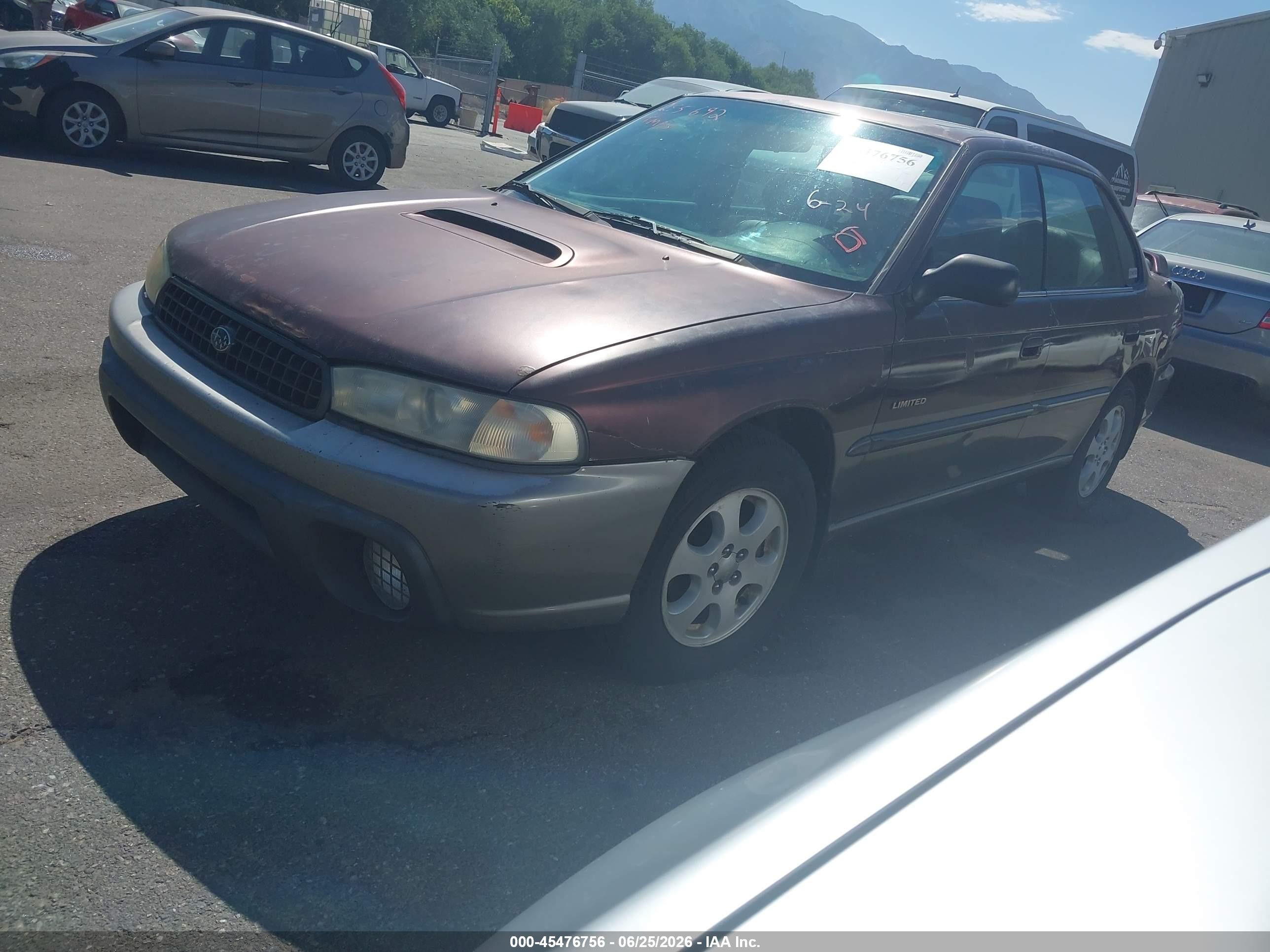 1999 Subaru Legacy 30th Ann. Sus/30th Ann. Sus Ltd. Red vin: 4S3BD685XX7255692