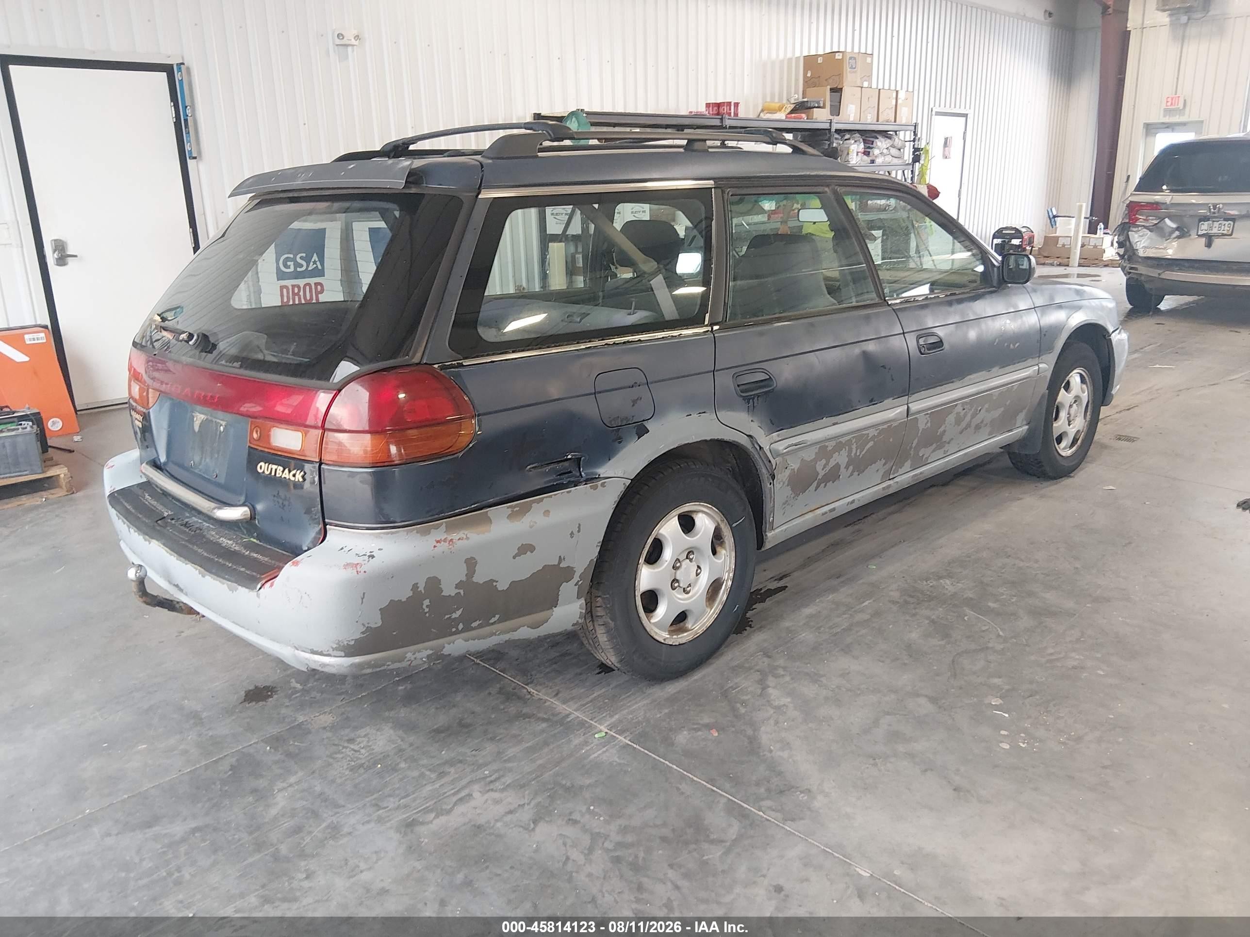 1996 Subaru Legacy Outback Blue vin: 4S3BG4850T6985316