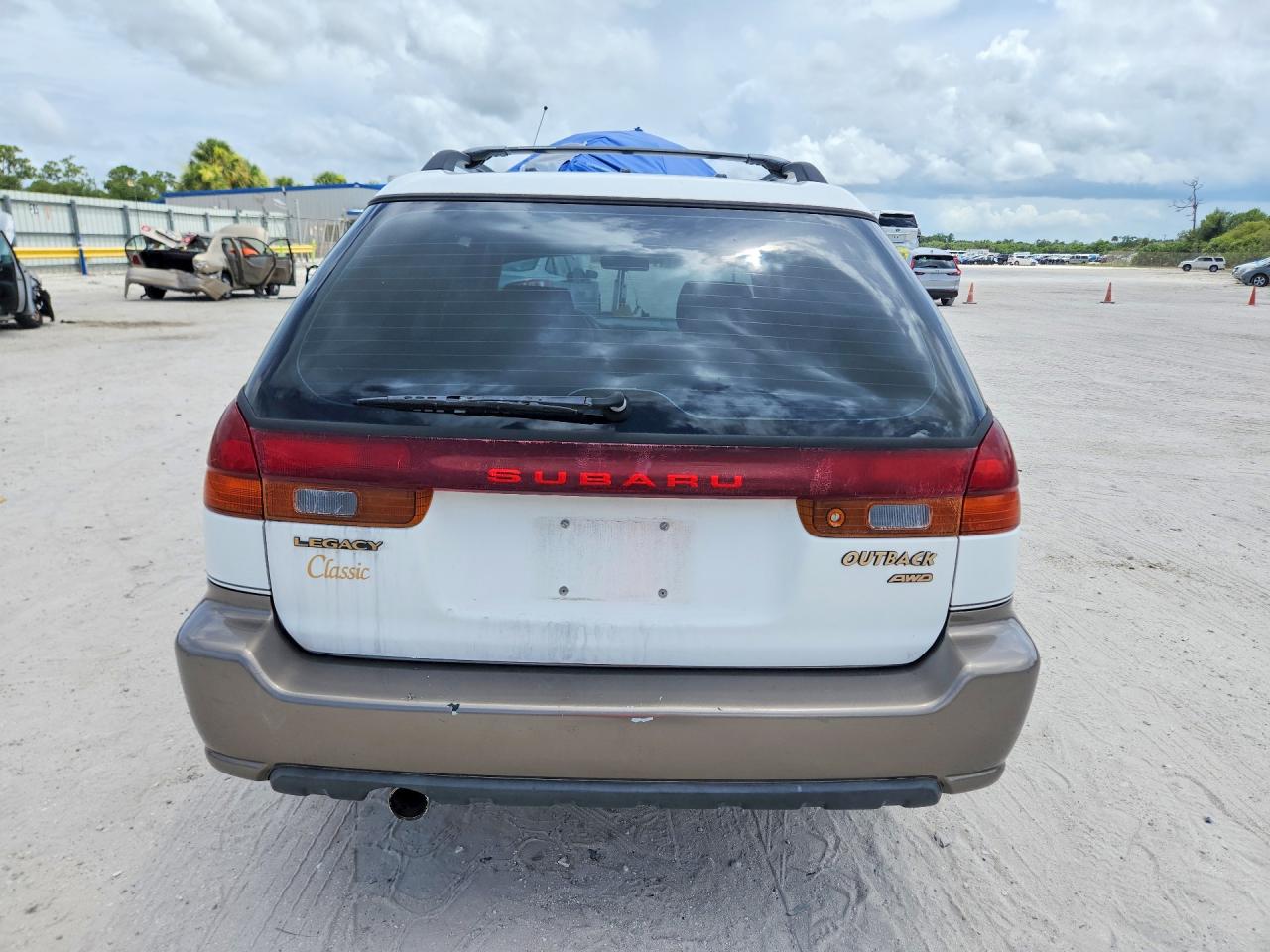 1997 Subaru Legacy Outback White vin: 4S3BG6851V7655077