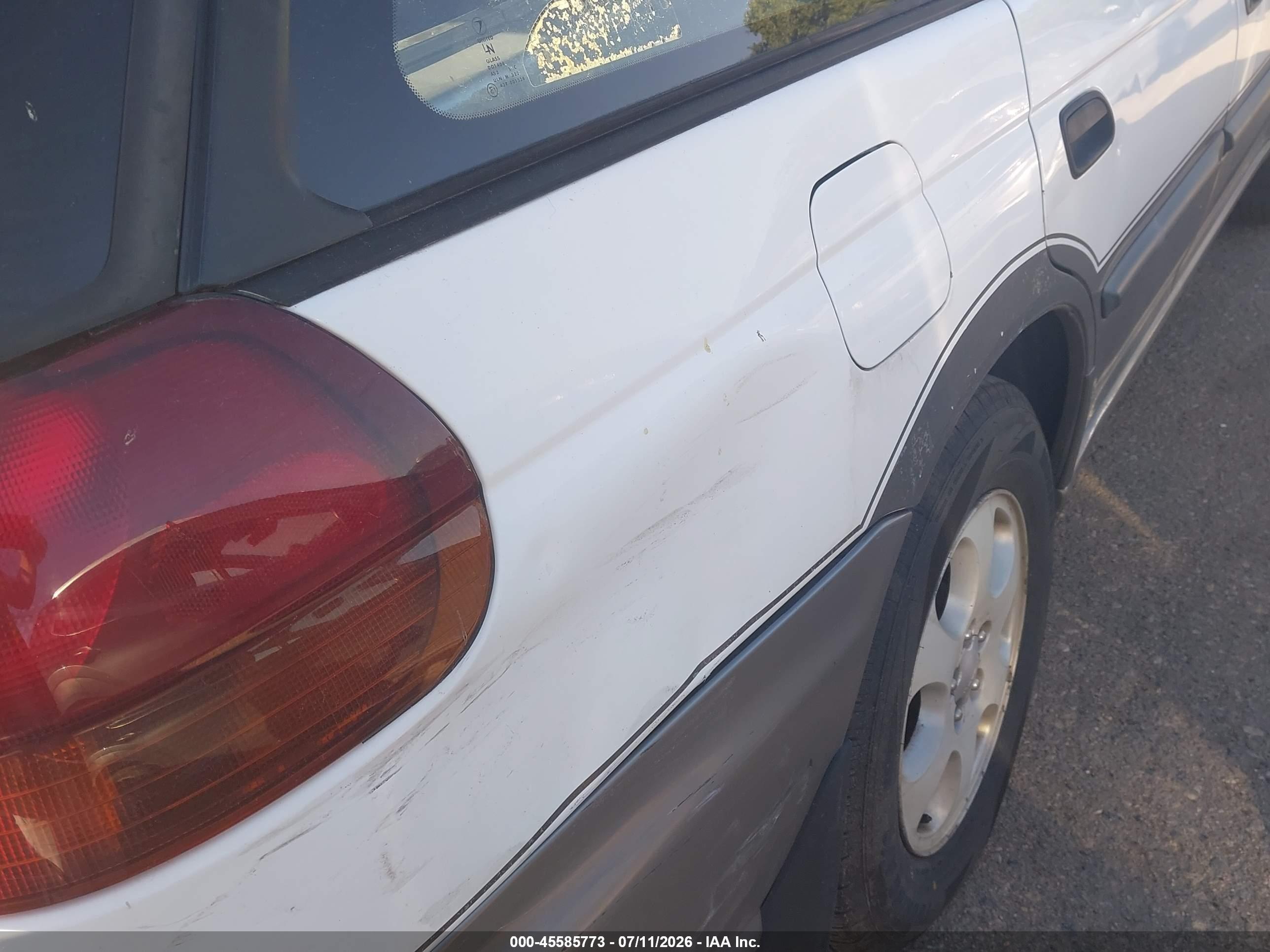 1999 Subaru Legacy 30th Ann. Outback Ltd./outback White vin: 4S3BG6851X7654658