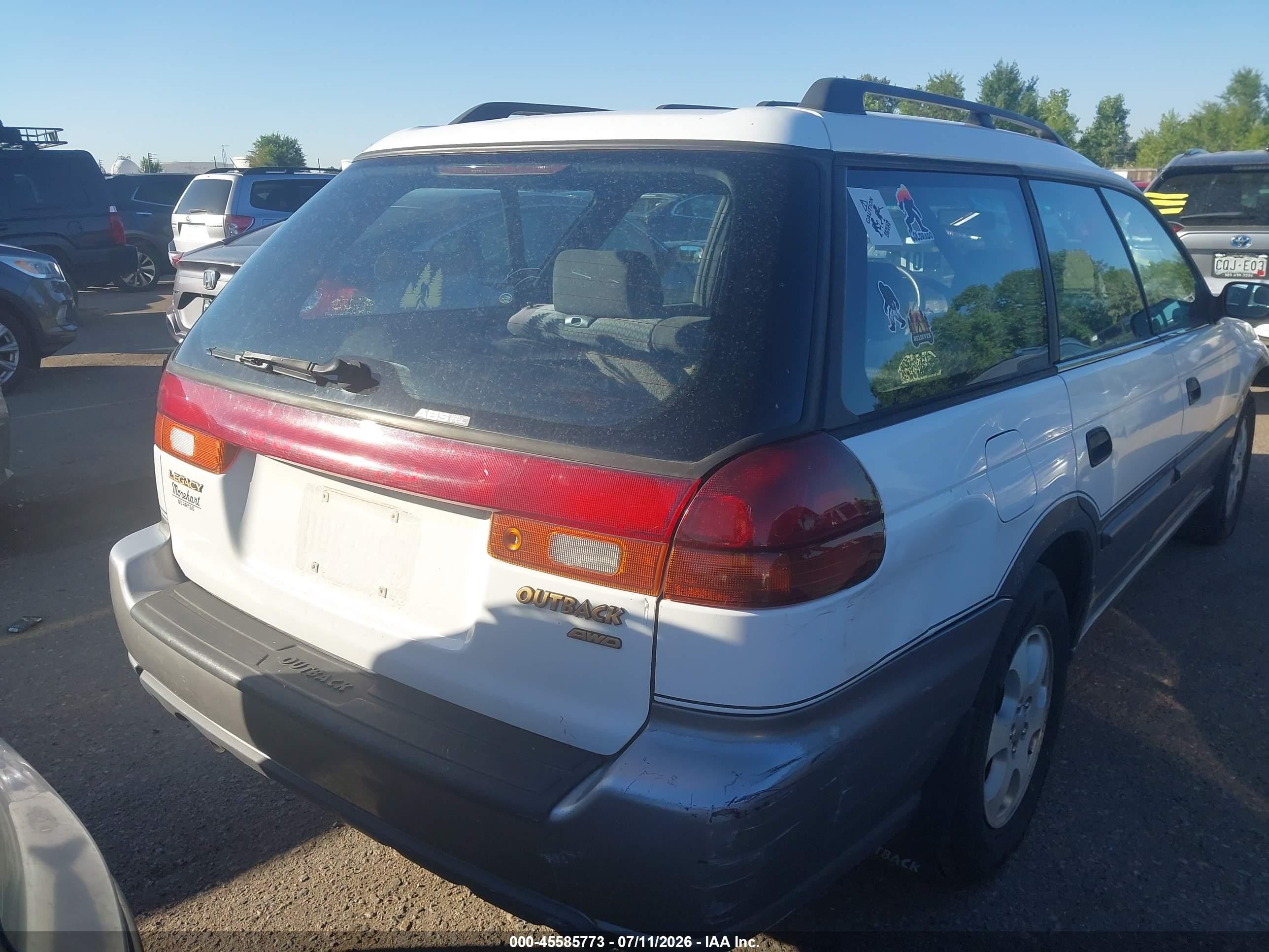 1999 Subaru Legacy 30th Ann. Outback Ltd./outback White vin: 4S3BG6851X7654658