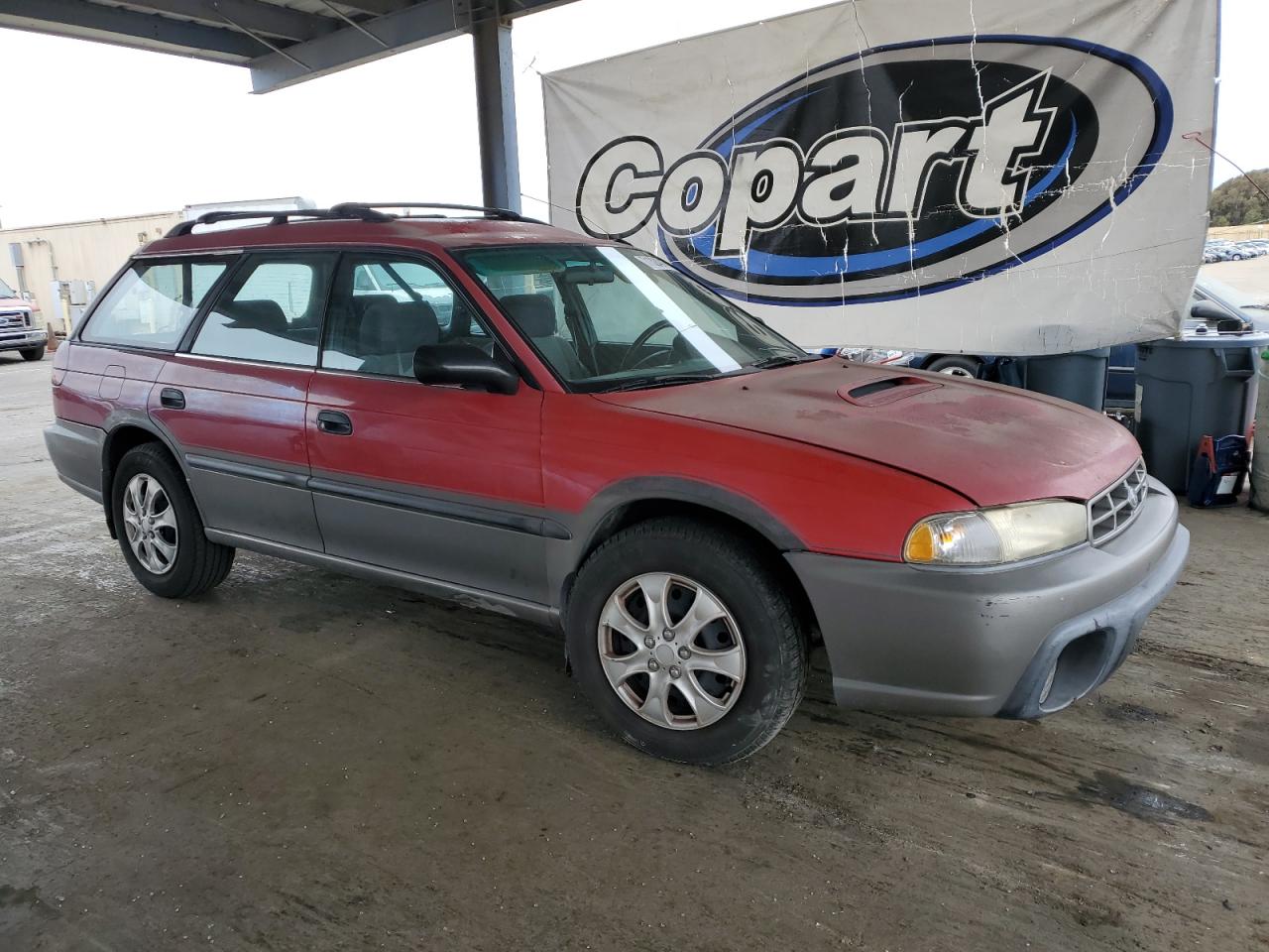 1999 Subaru Legacy Outback Red vin: 4S3BG6853X6610263