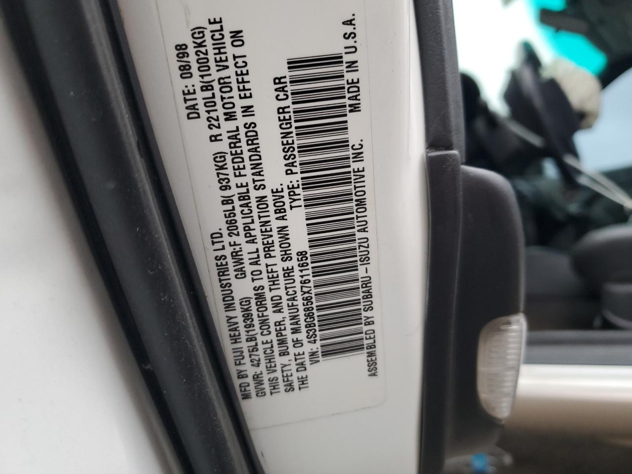 1999 Subaru Legacy Outback White vin: 4S3BG6856X7611658