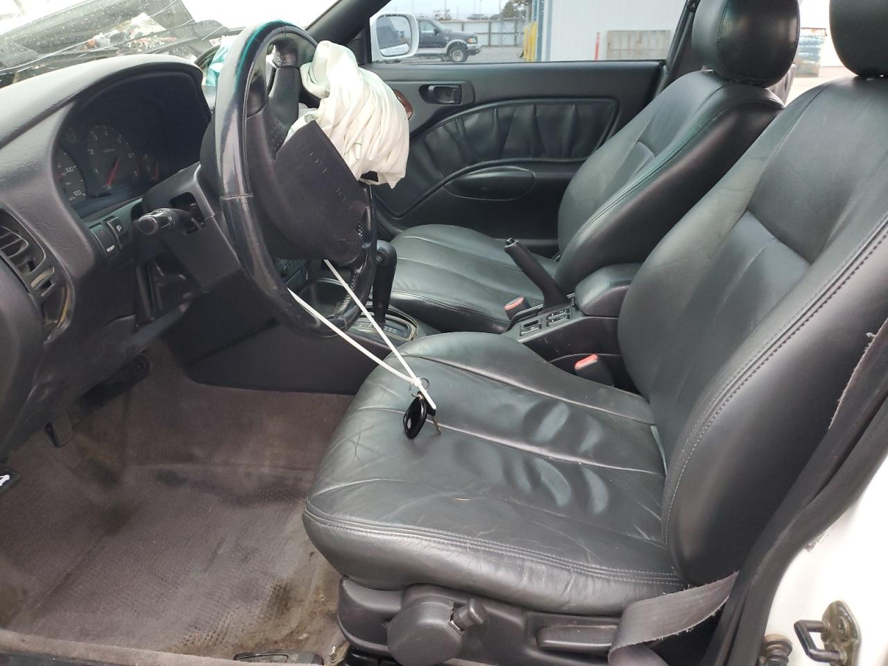 1999 Subaru Legacy Outback White vin: 4S3BG6856X7611658