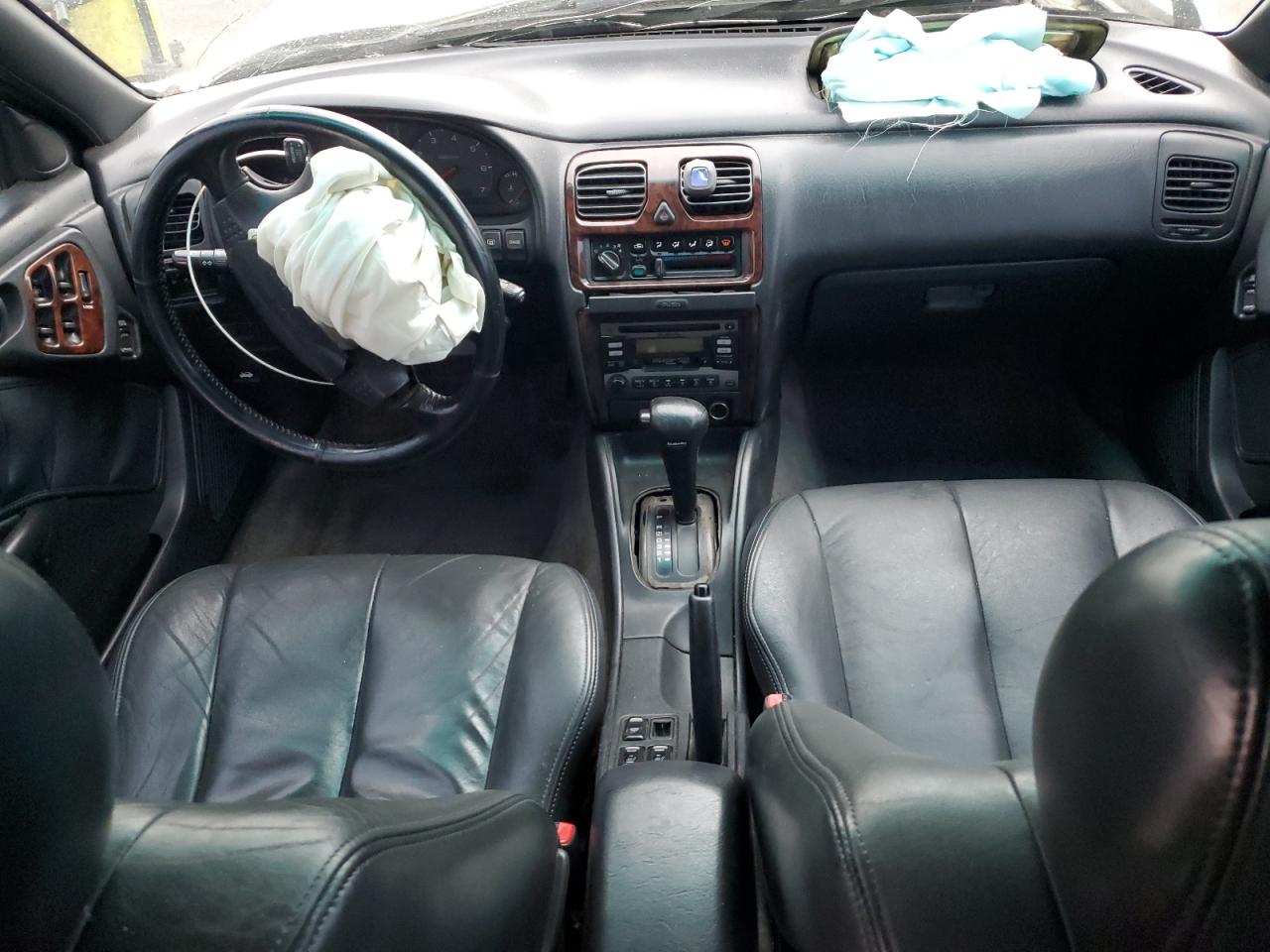 1999 Subaru Legacy Outback White vin: 4S3BG6856X7611658