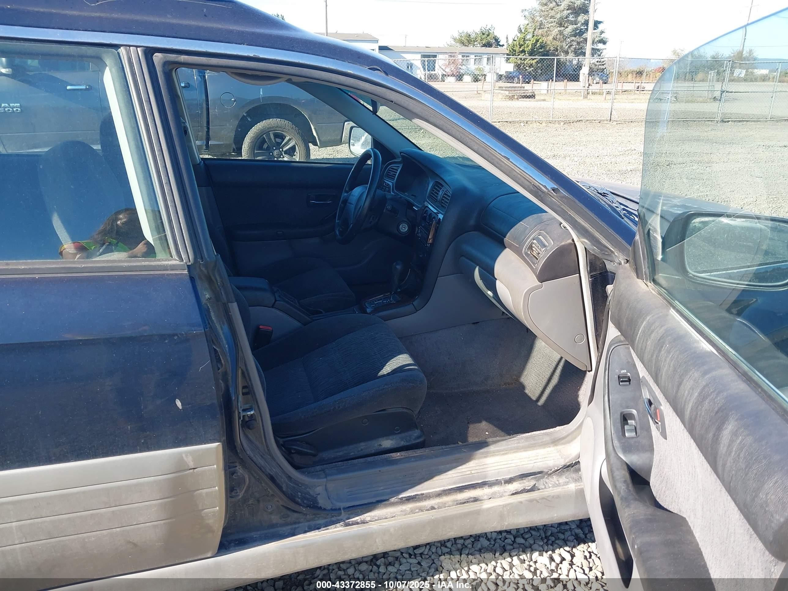 2001 Subaru Outback   Black vin: 4S3BH665917627117