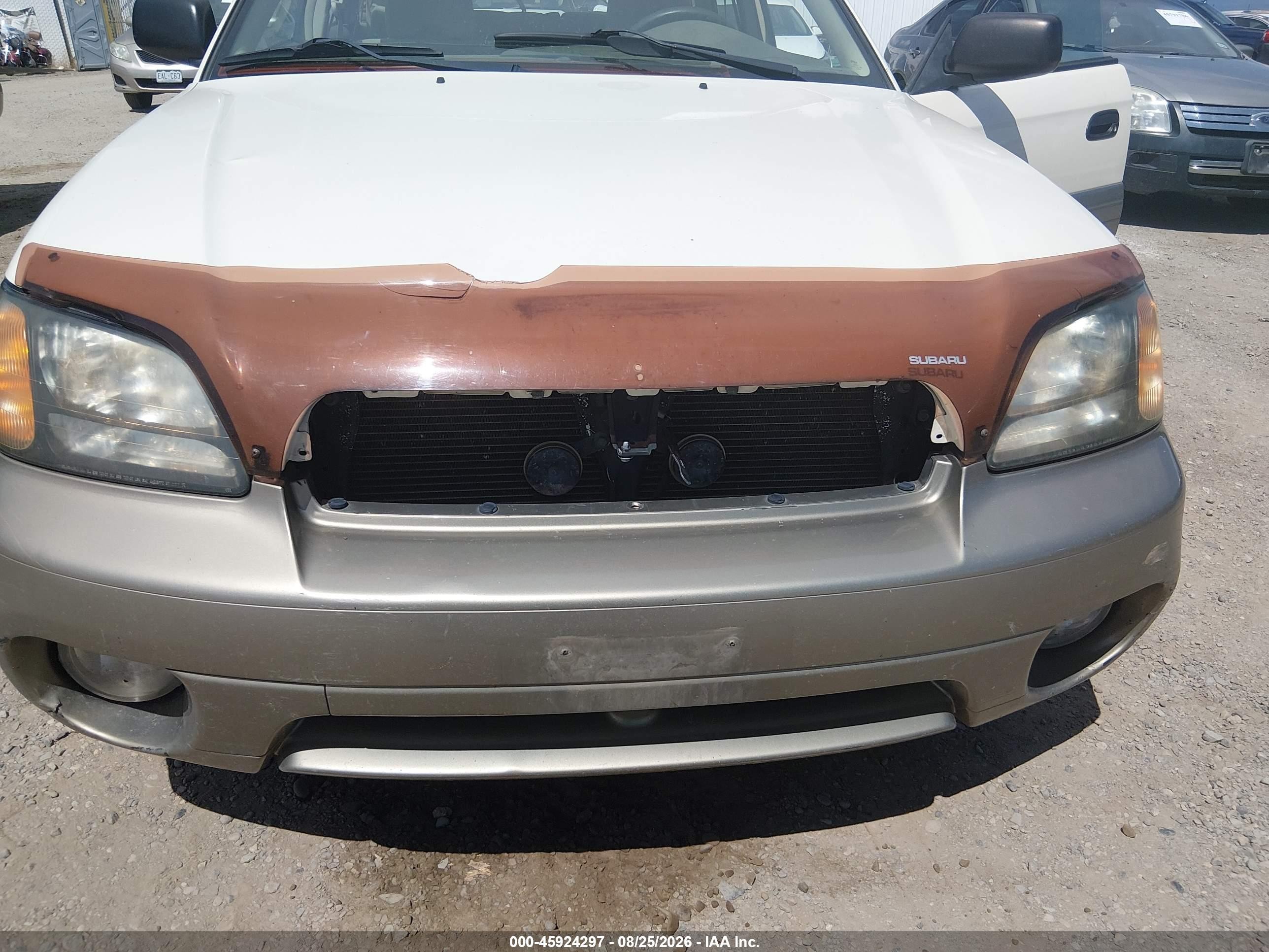 2004 Subaru Outback   White vin: 4S3BH675247628435