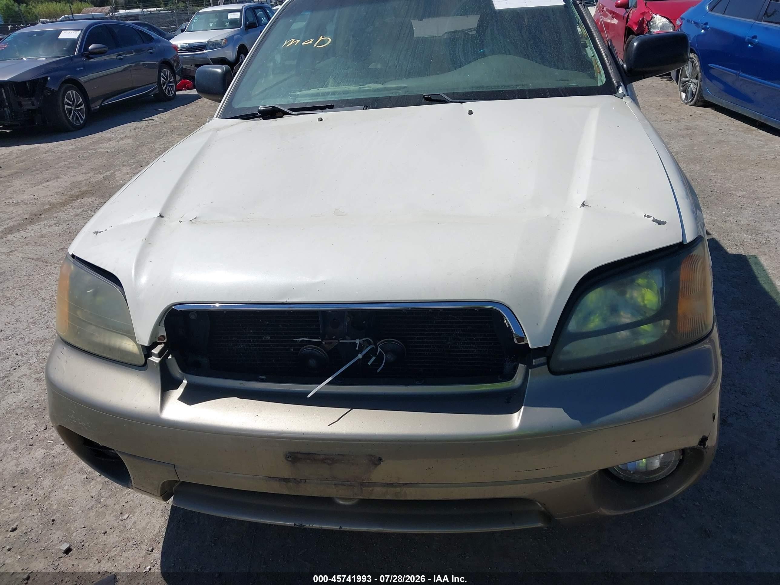 2004 Subaru Outback   White vin: 4S3BH675347607741