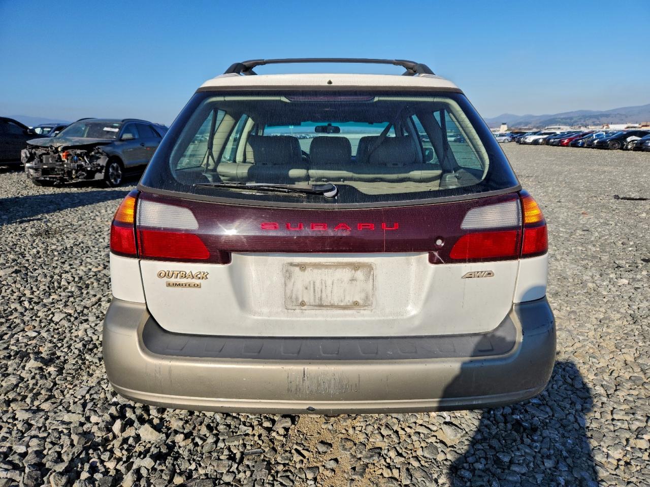 2000 Subaru Legacy Outback Limited White vin: 4S3BH6865Y7626837