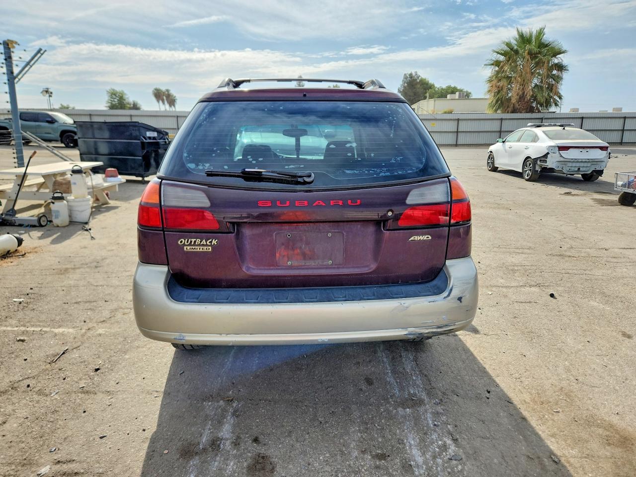 2000 Subaru Legacy Outback Limited Burgundy vin: 4S3BH6869Y7650025