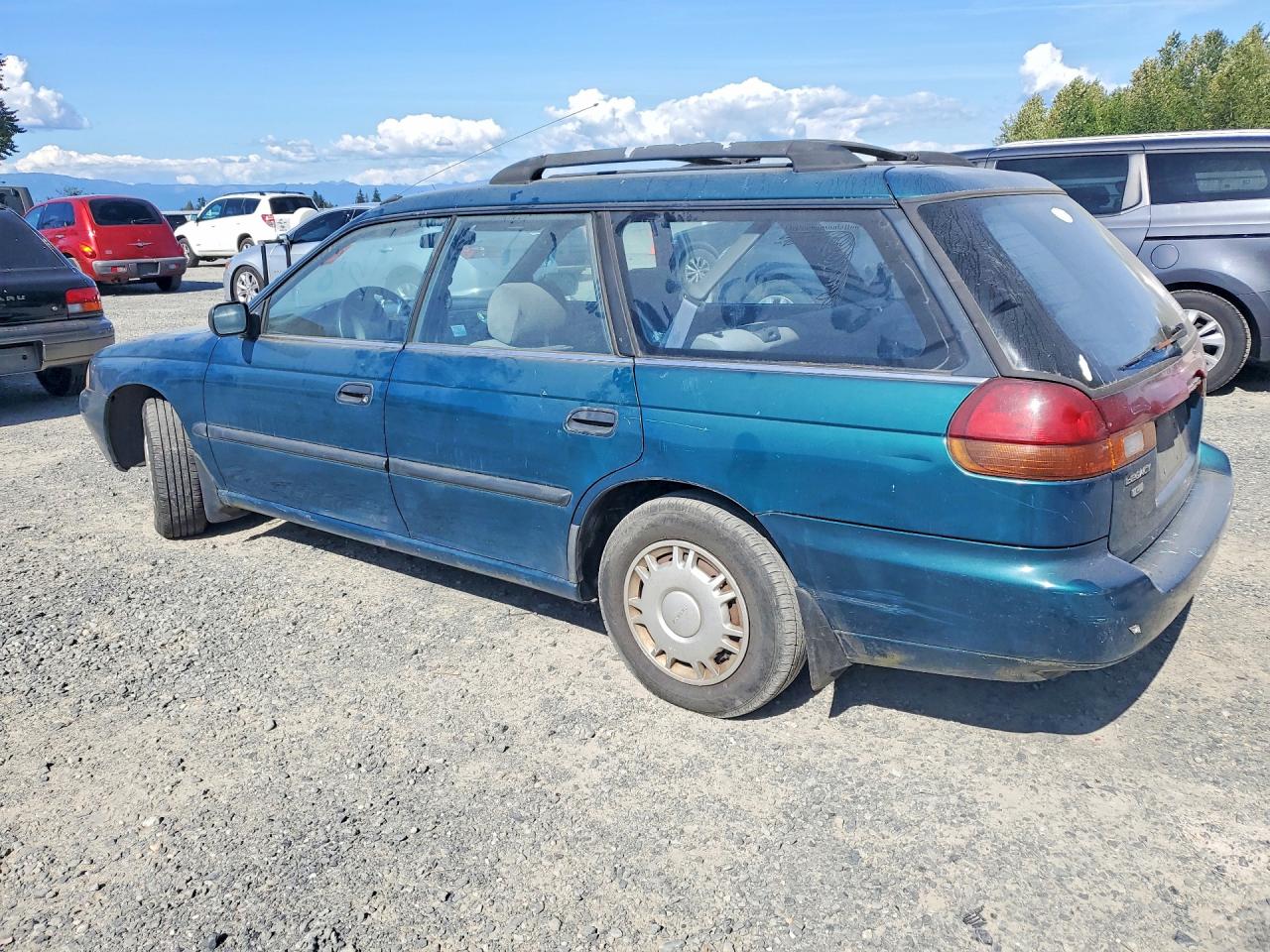 1997 Subaru Legacy L Green vin: 4S3BK4353V6305482