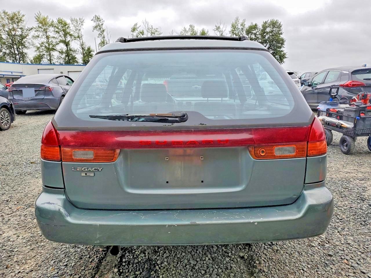 1995 Subaru Legacy L Teal vin: 4S3BK6359S7344336