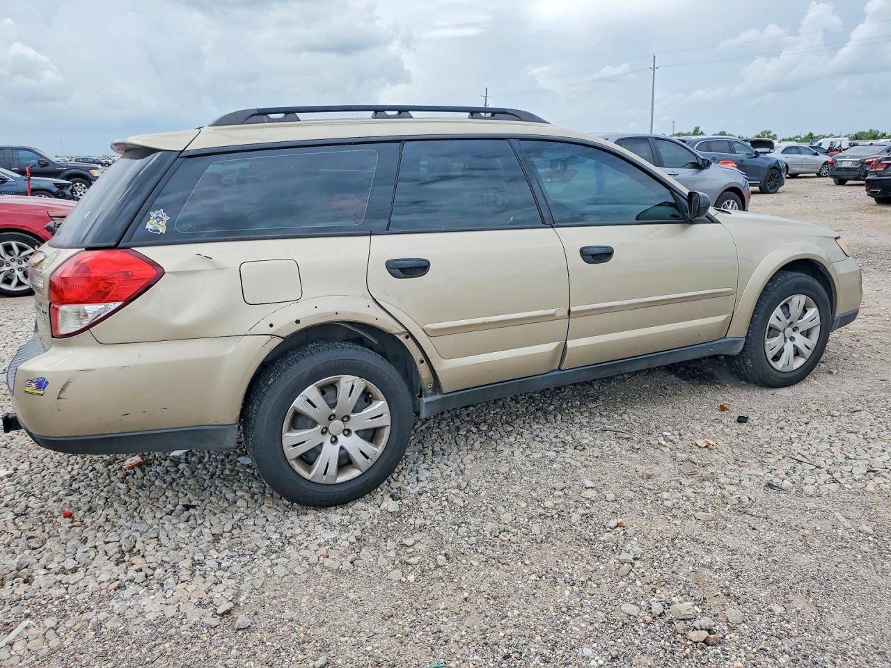 2009 Subaru Outback Золотой vin: 4S4BP60C497317958