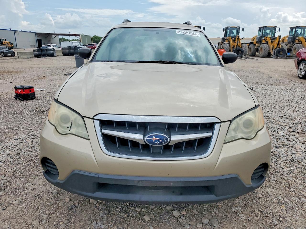 2009 Subaru Outback Золотой vin: 4S4BP60C497317958