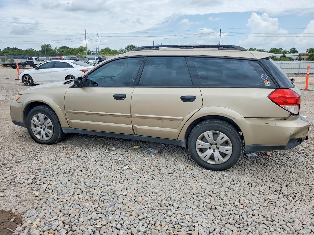 2009 Subaru Outback Золотой vin: 4S4BP60C497317958