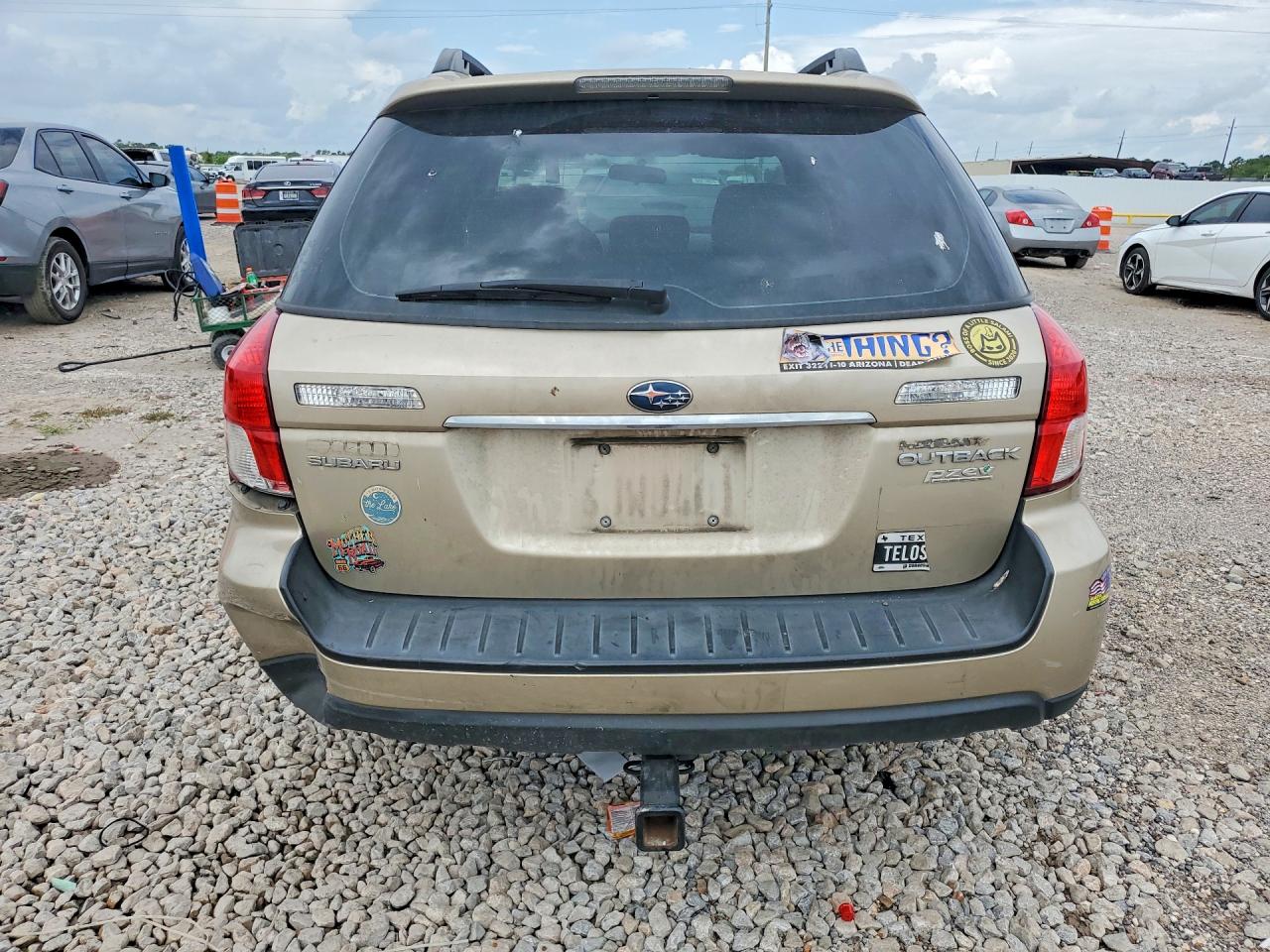 2009 Subaru Outback Золотой vin: 4S4BP60C497317958