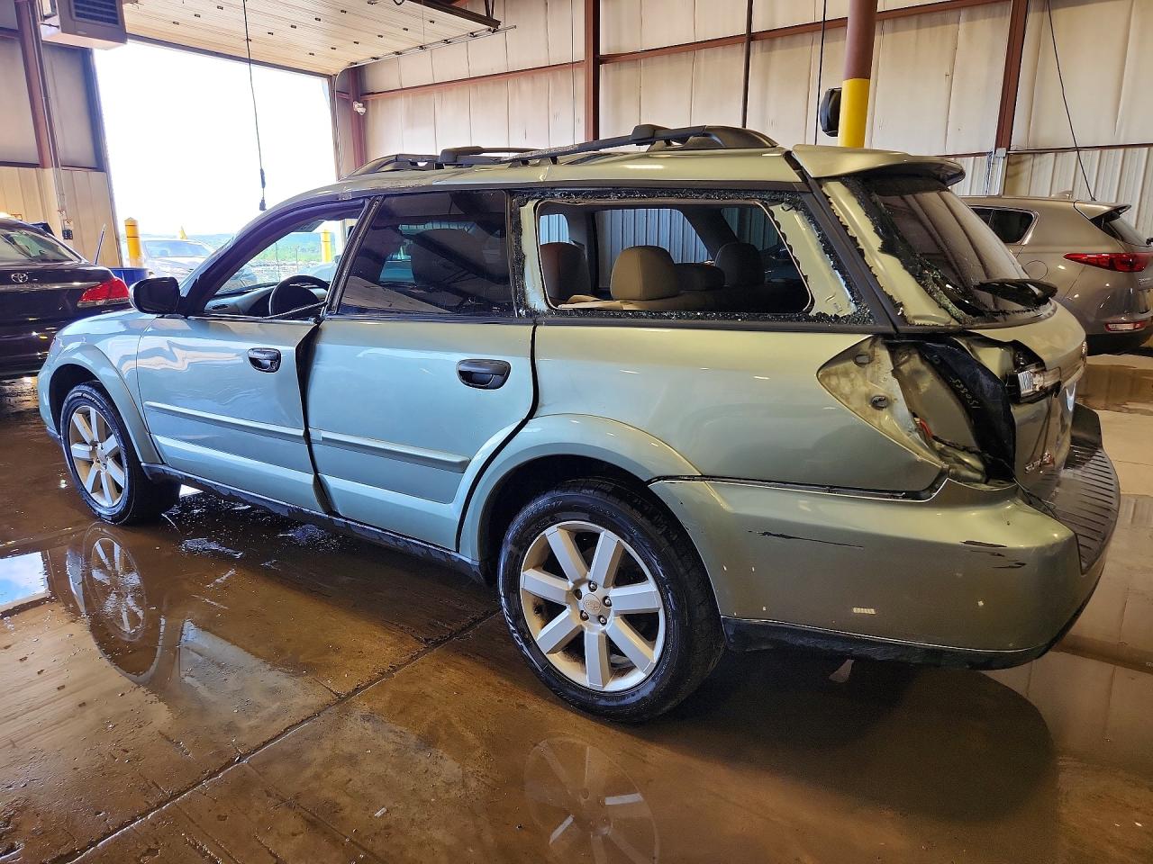 2009 Subaru Outback 2.5i Tan vin: 4S4BP61C097324954