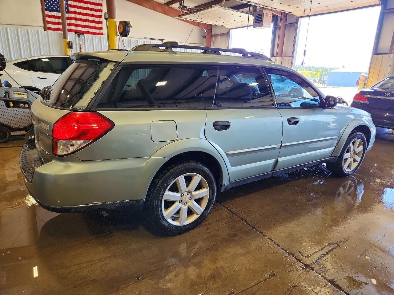 2009 Subaru Outback 2.5i Tan vin: 4S4BP61C097324954