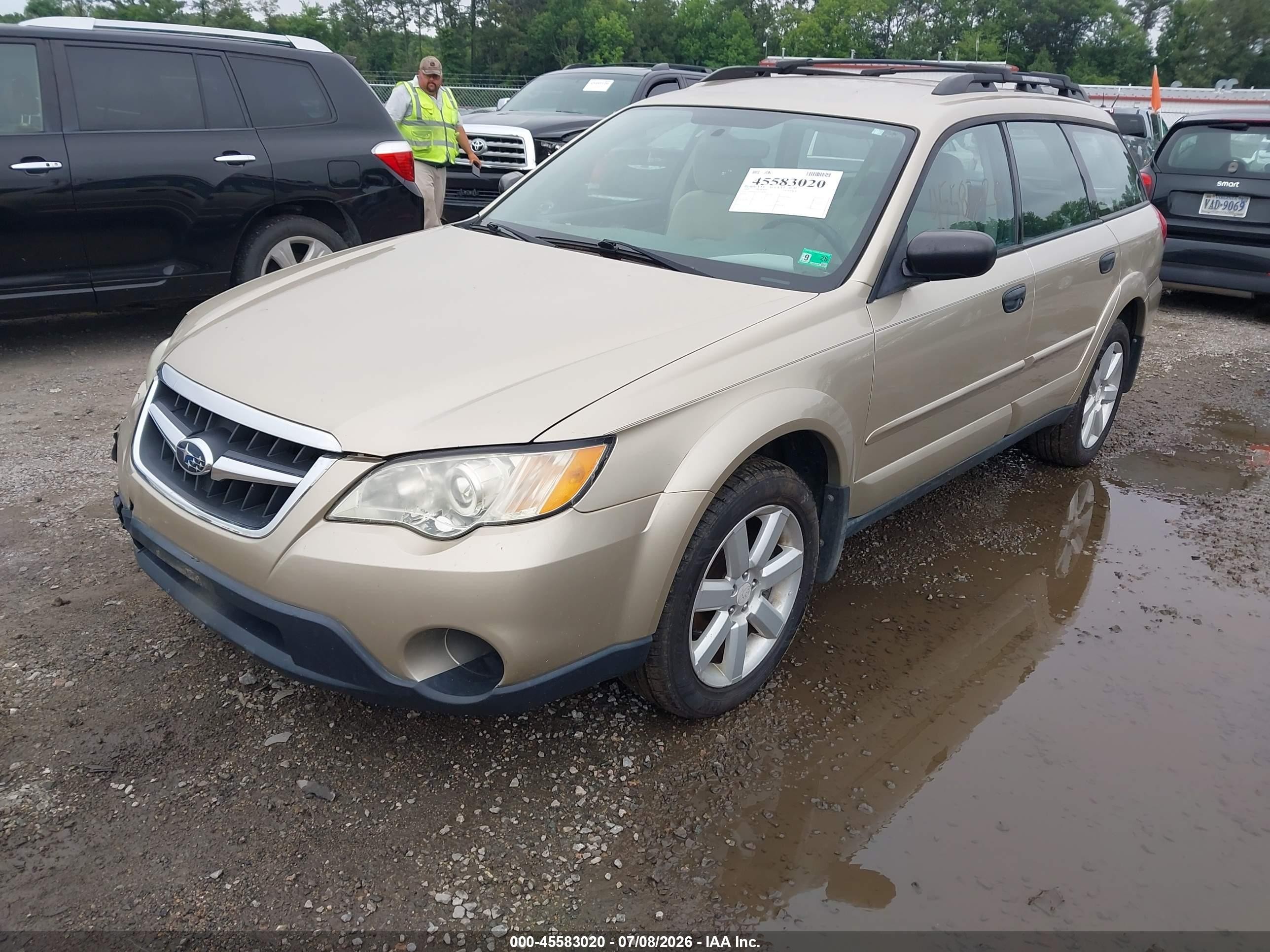 2009 Subaru Outback 2.5i Gold vin: 4S4BP61C697334520